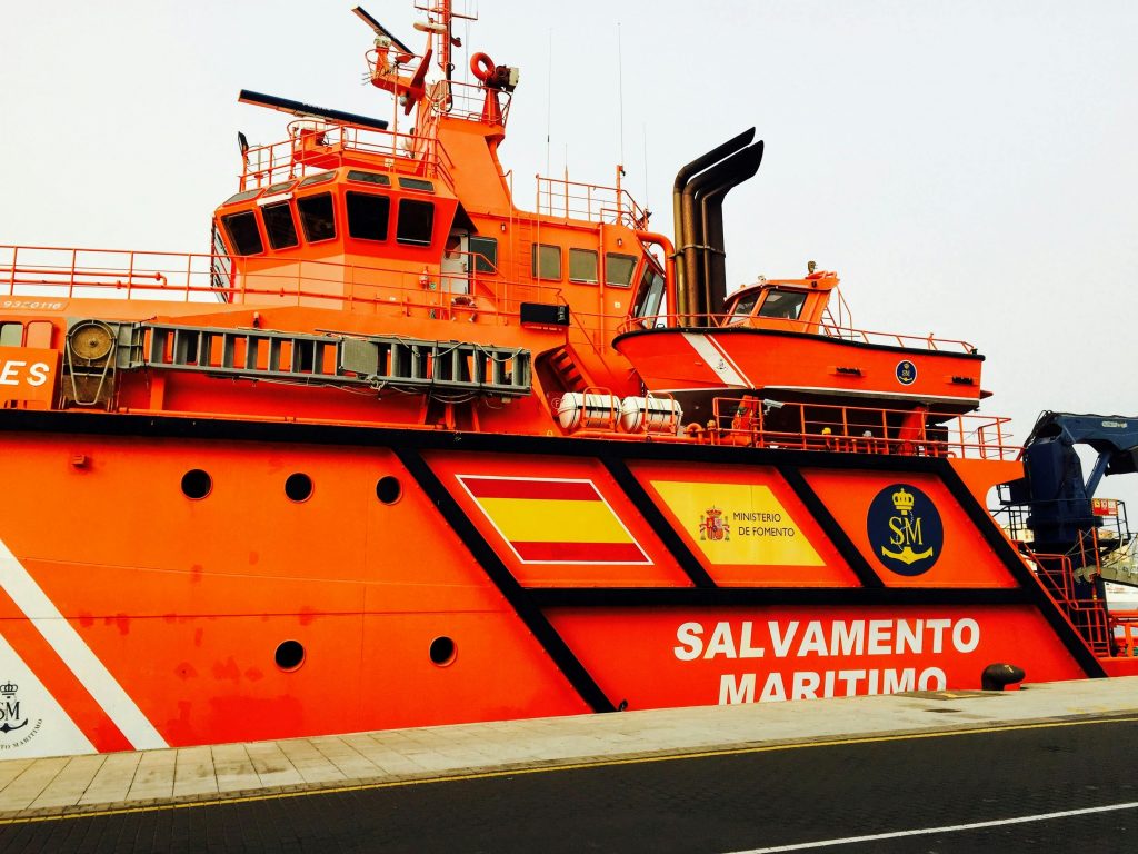 Bright orange maritime rescue ship docked in Las Palmas, Gran Canaria.
